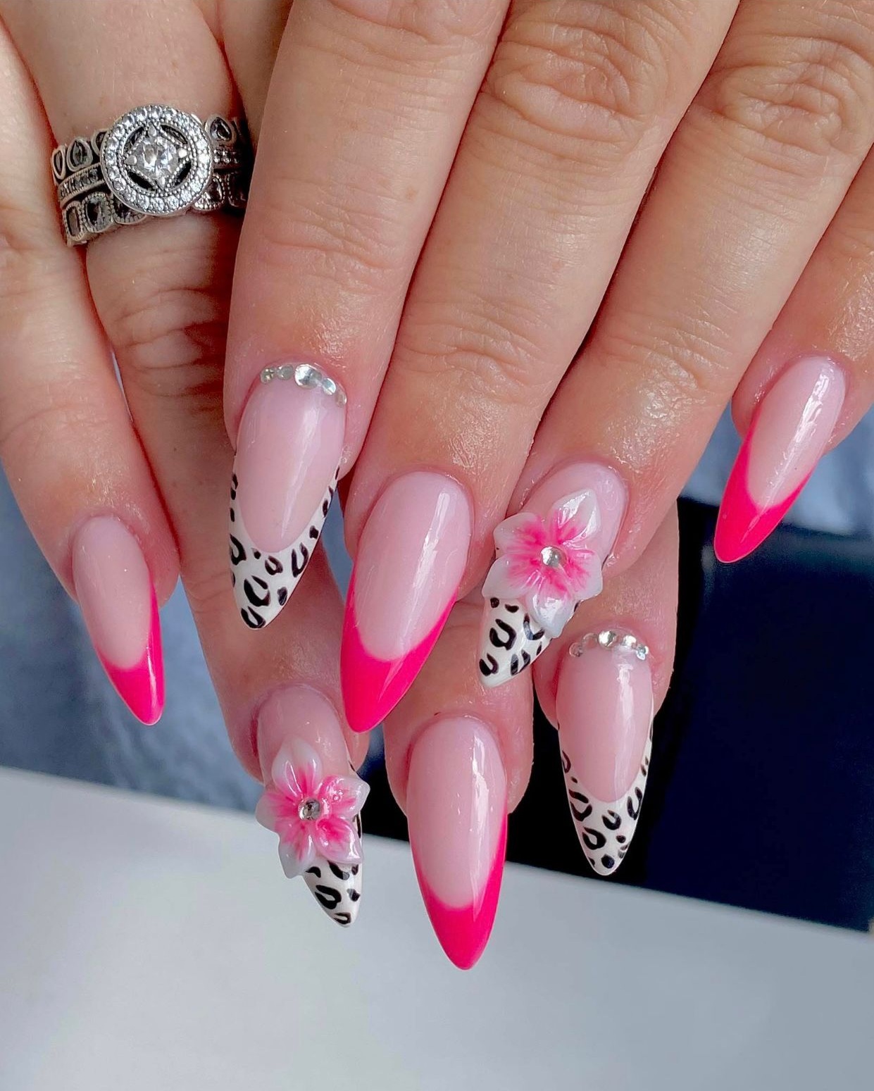 Elegant soft pink gel manicure with almond-shaped nails